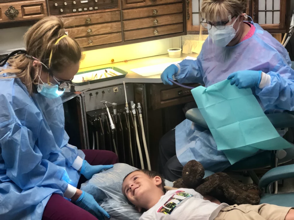 child smiling at the dentist | best pediatric dentist in Laurel, Montana